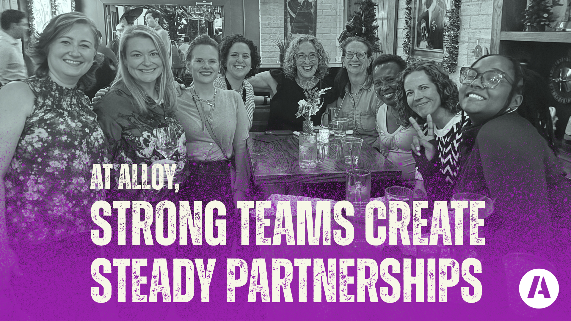 Group dining portrait with Strong Teams headline overlay